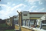 schade na EF 2 tornado. Bron: wikipedia 