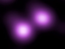 SN 2006gy (rechtsboven) en zijn melkwegstelsel NGC 1260 (linksonder) in valse kleuren. Chandra X-Ray Observatory.Bron: Wikipedia 